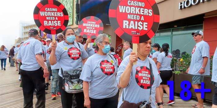 people protesting outside of 18+ casinos for better wages.